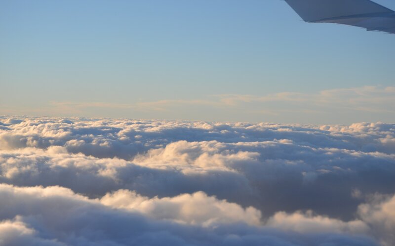 Airplane Wing Above Clouds — Blue, Serene, Morning, Photograph, Airplane Wing