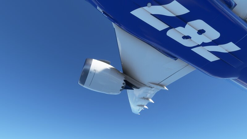 Airplane Wing and Engine — Blue, Serene, Afternoon