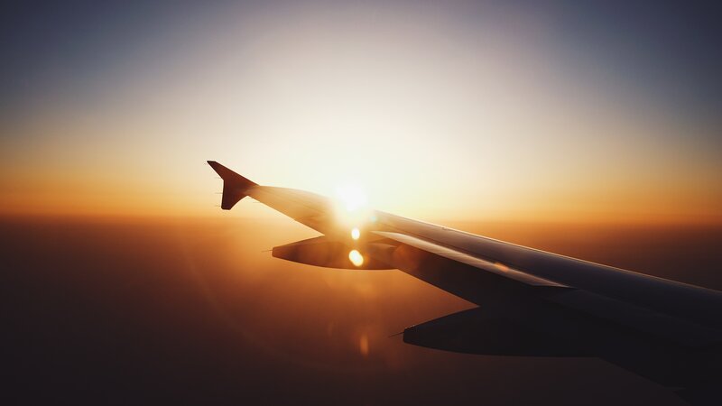 Airplane Wing at Sunset — Orange, Serene, Photograph, Sun