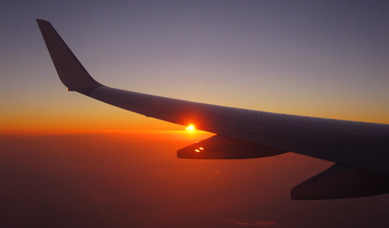 Airplane Wing at Sunset — Orange, Serene