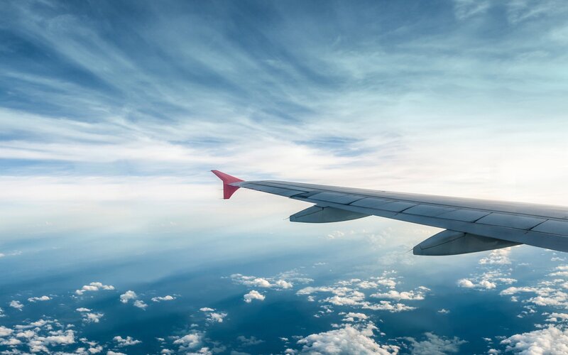 Airplane Wing in Sky — Blue, Serene