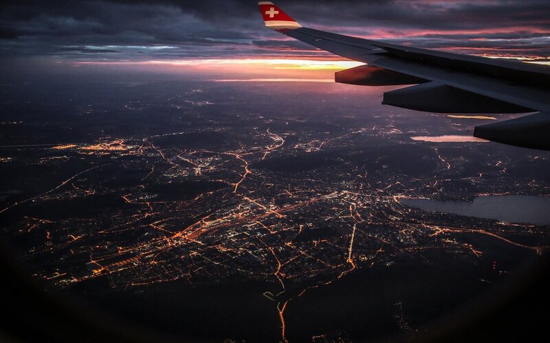 Airplane Wing over City — Purple