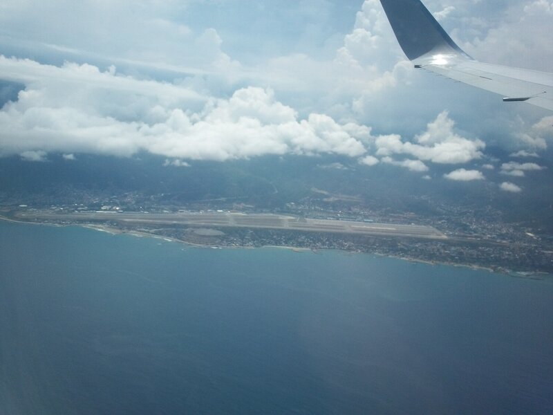 Airplane Wing over Coast