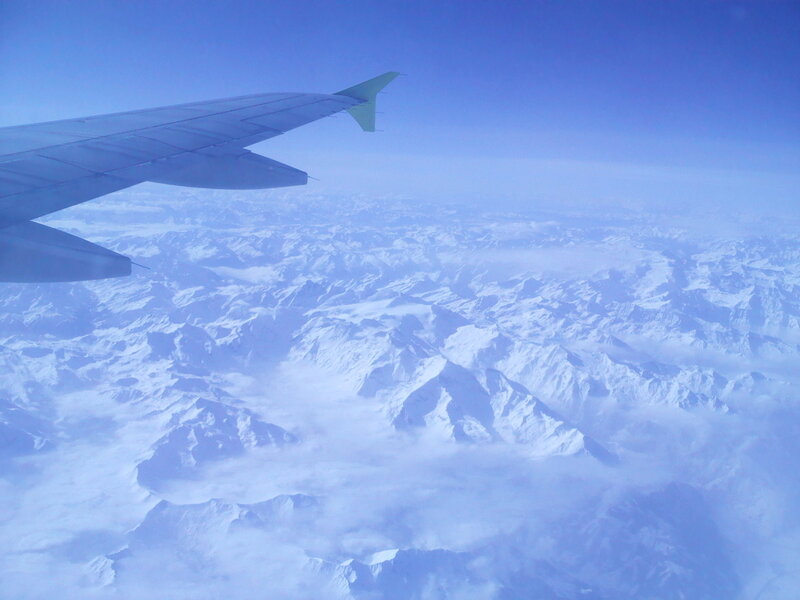 Airplane Wing over Mountains — Blue, Serene, Photograph