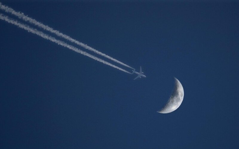 Airplane with Contrails — Blue, Serene, Night, Photograph, Moon, Sky