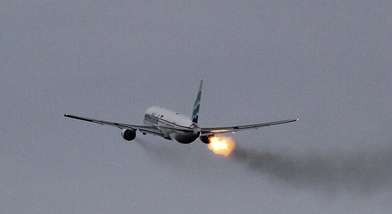 Airplane with Engine Fire — Gray