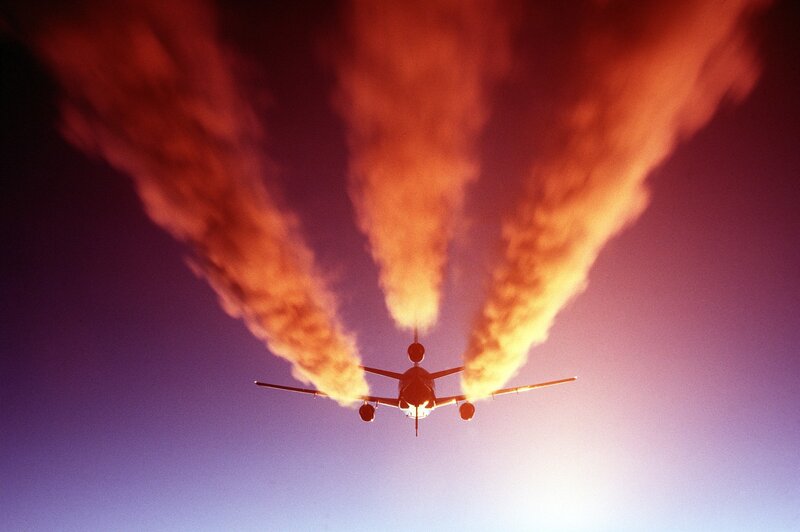 Airplane with smoke trails