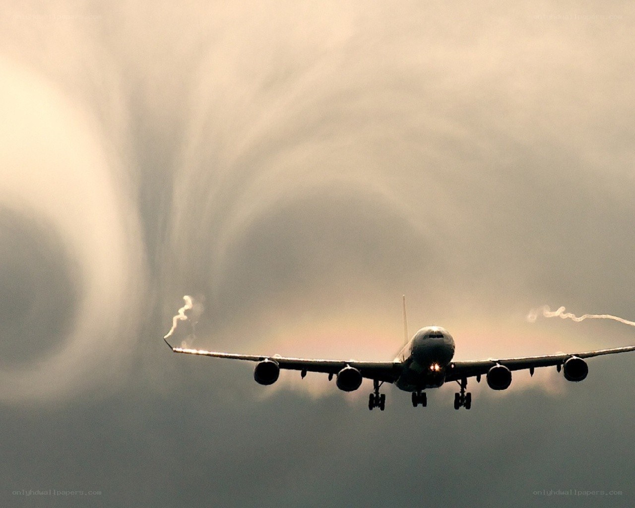 Airplane with vapor trails