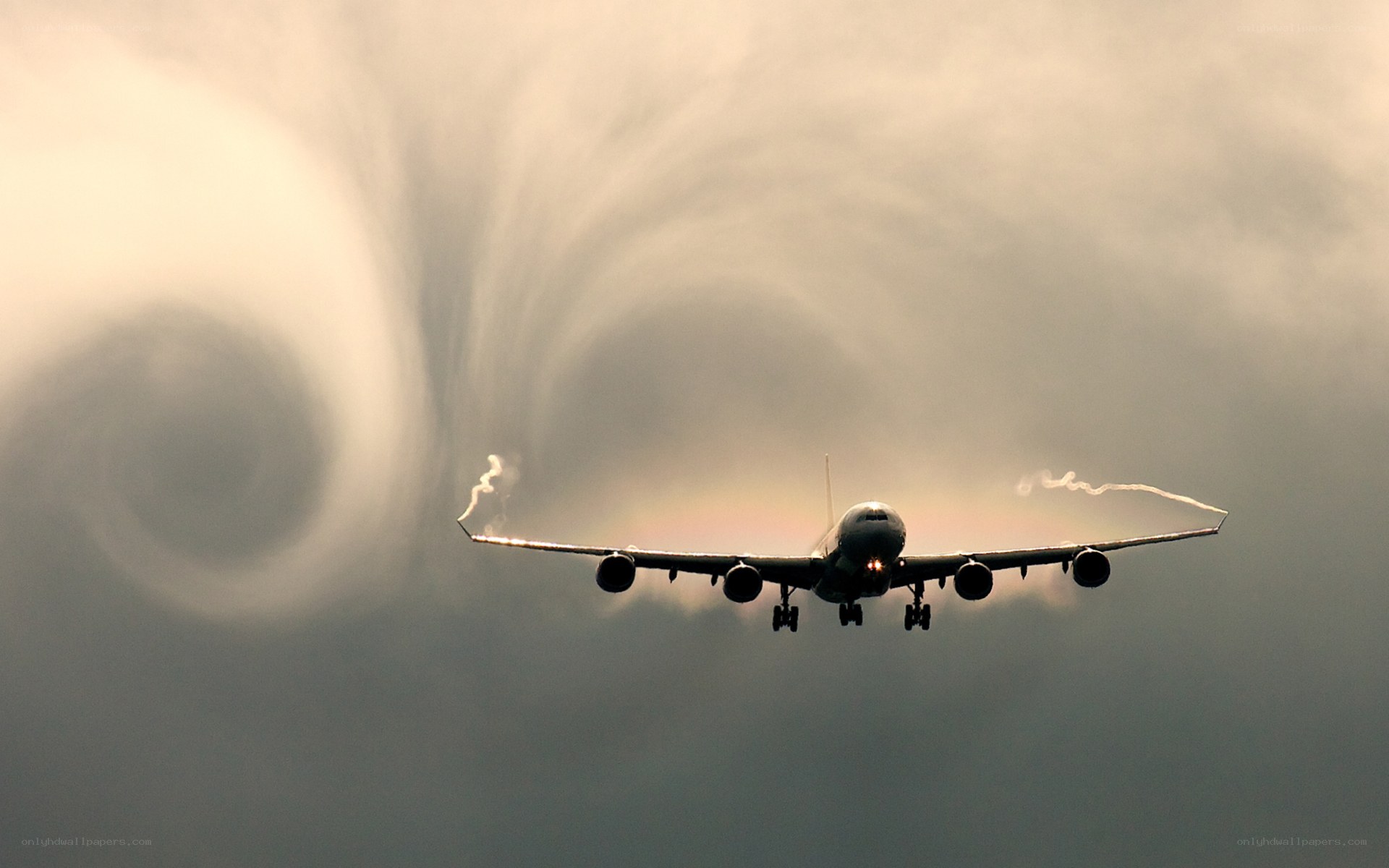 airplane with wingtip vortices