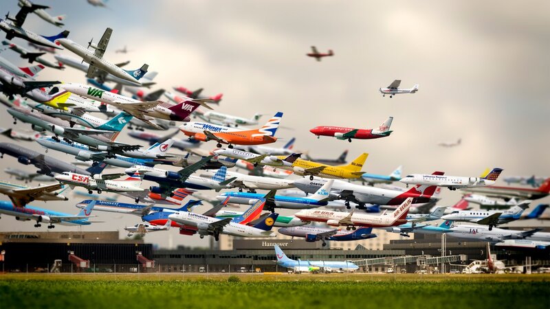 Airplanes at Airport — Gray, Dramatic