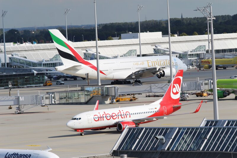 Airplanes at Airport — White, Busy