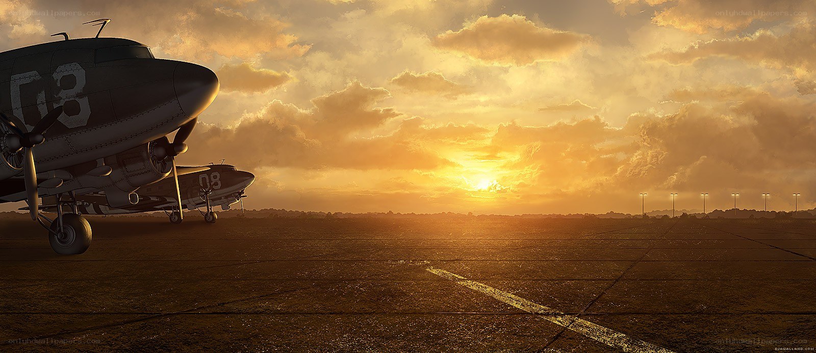 Airplanes at sunset on a runway