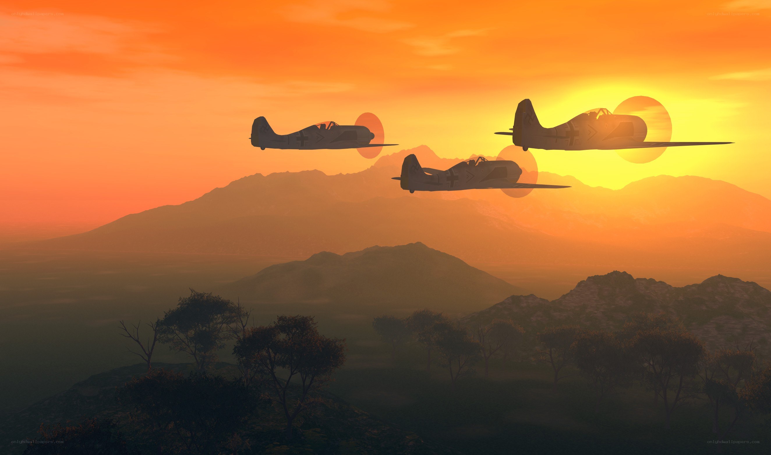 Airplanes flying over mountains at sunset