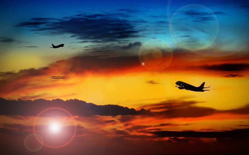 Airplanes in Sunset Sky — Orange, Dramatic