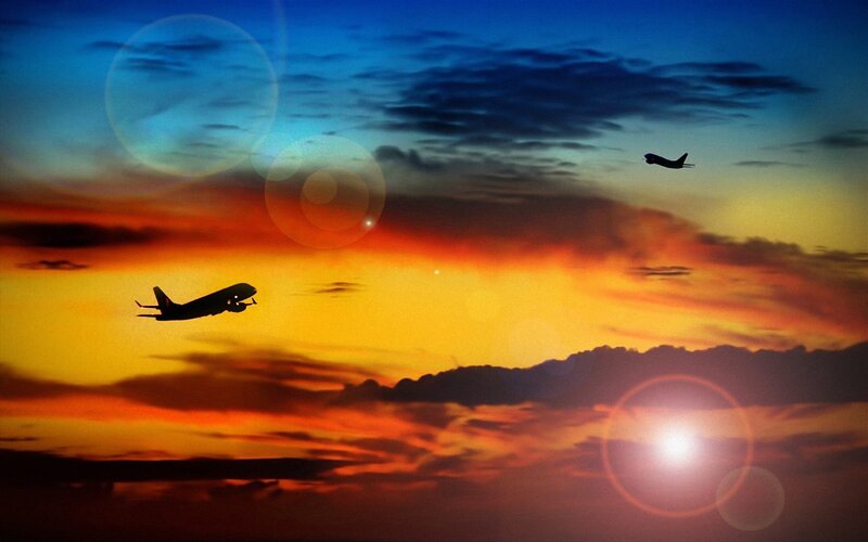 Airplanes in Sunset Sky — Orange