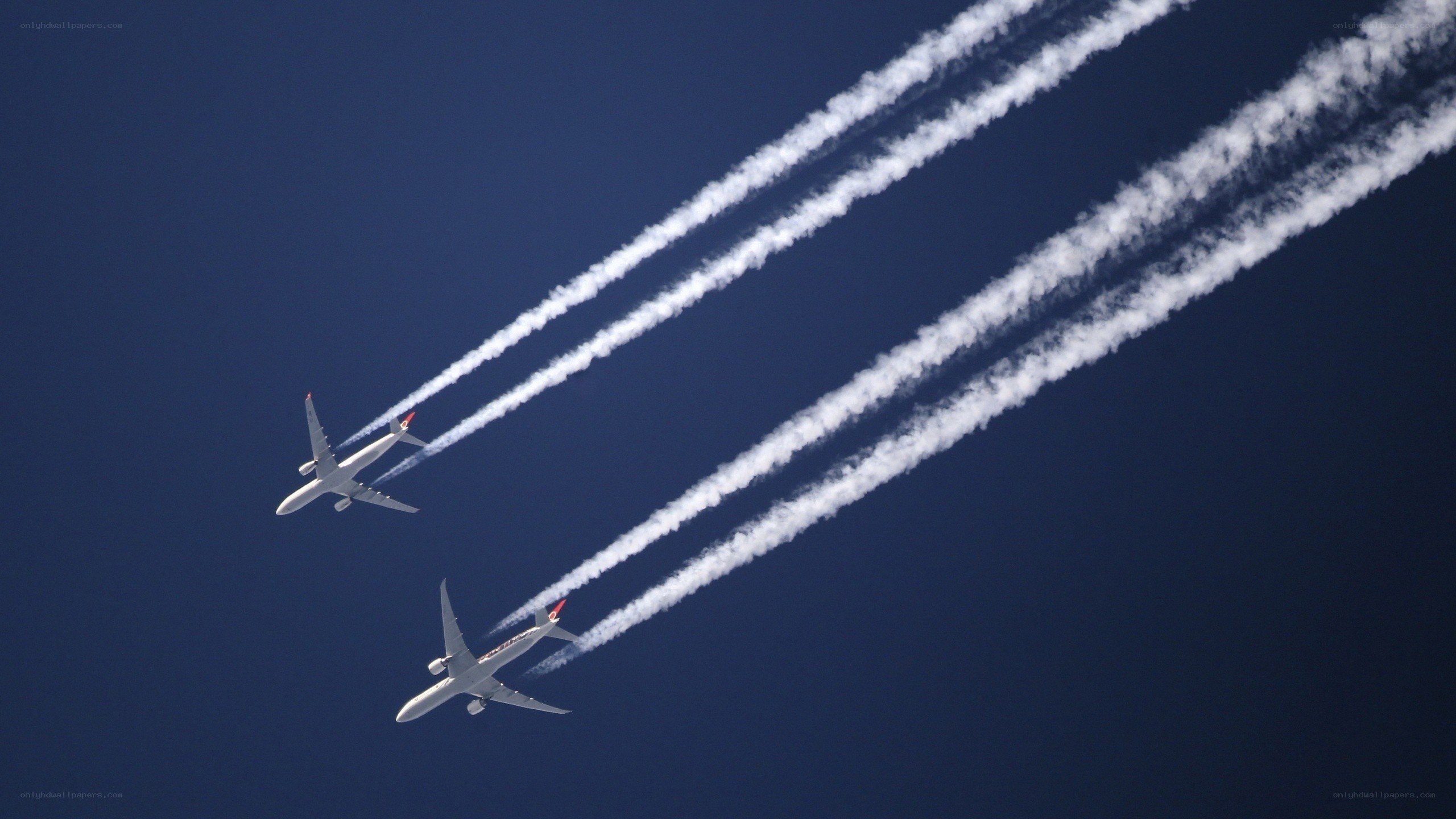 Airplanes leaving contrails