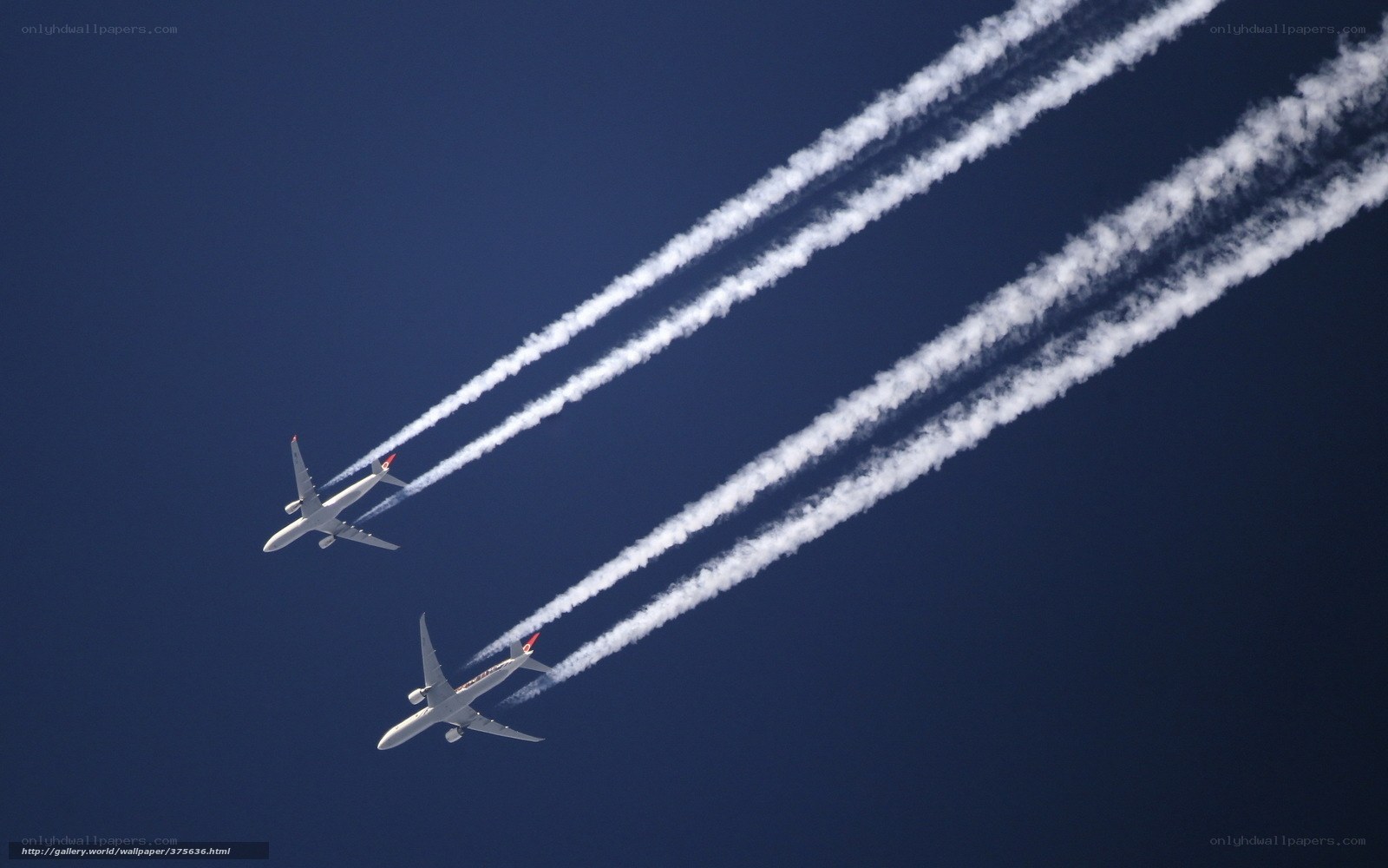Airplanes leaving contrails