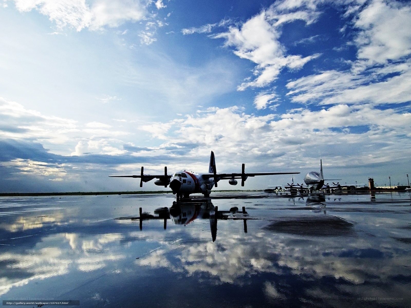 Airplanes on wet tarmac