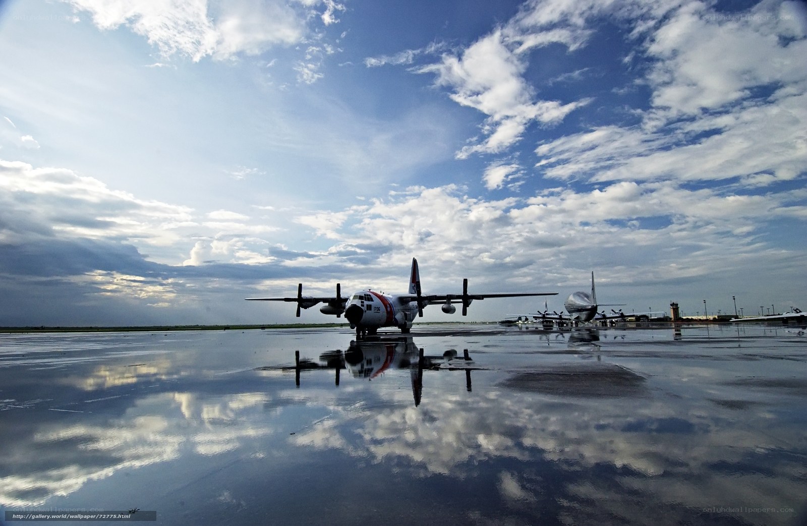 Airplanes on wet tarmac