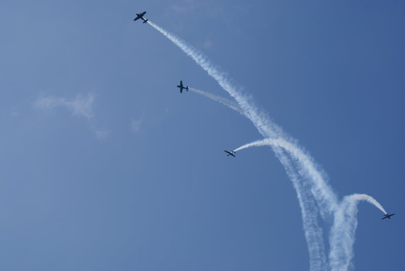Airplanes performing aerobatic display