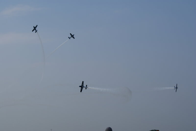 Airplanes performing aerobatic stunts
