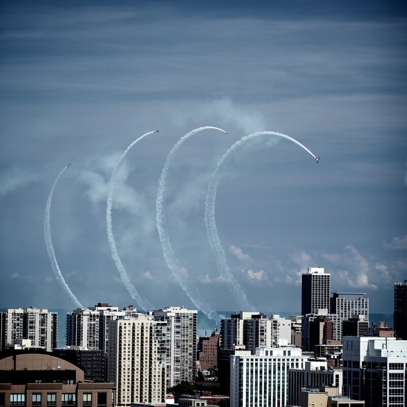 Airplanes Performing Aerobatics — Blue, Dramatic, Afternoon