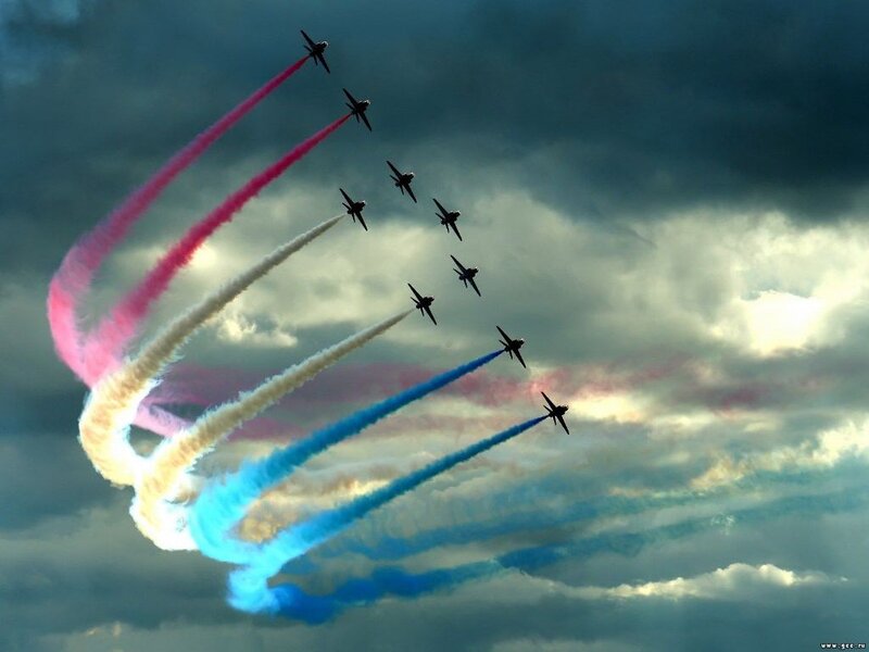 Airplanes Performing Aerobatics — Blue, Dramatic