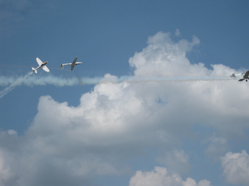 Airplanes Performing Aerobatics — Blue, Dynamic, Afternoon, Photograph, Clouds, Smoke Trails