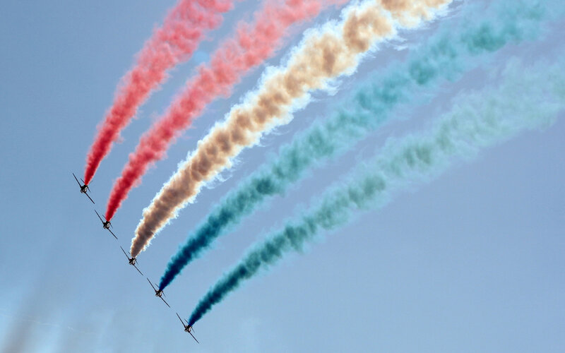 Airplanes with Colored Smoke