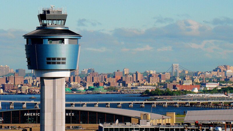 Airport control tower with city view