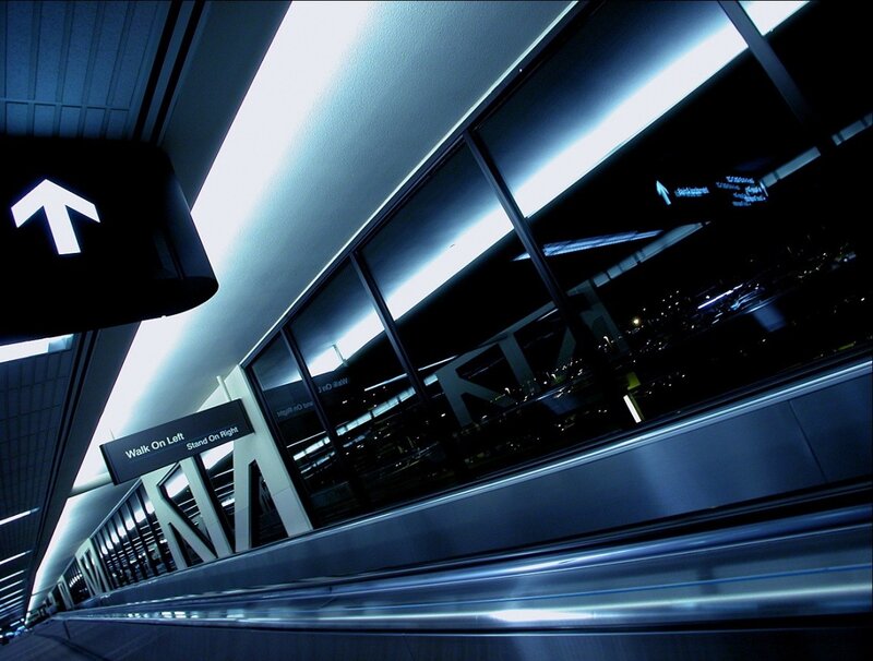 Airport moving walkway at night