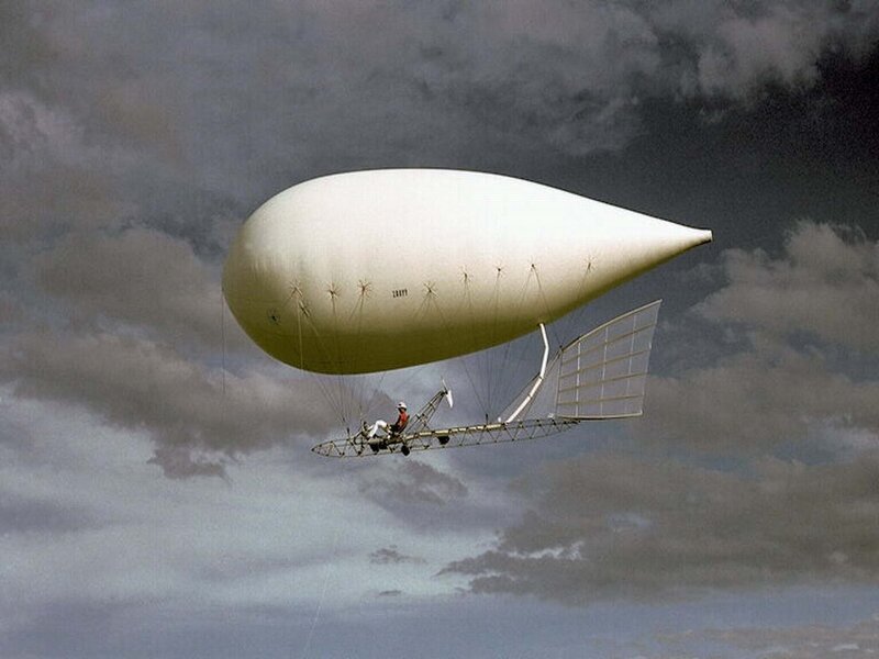 Airship in cloudy sky