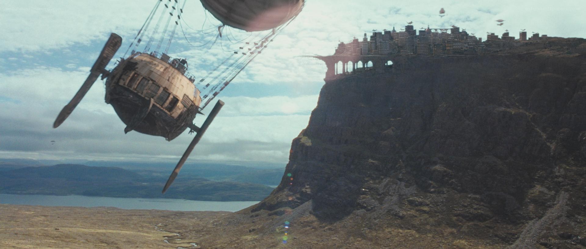airship near cliffside city