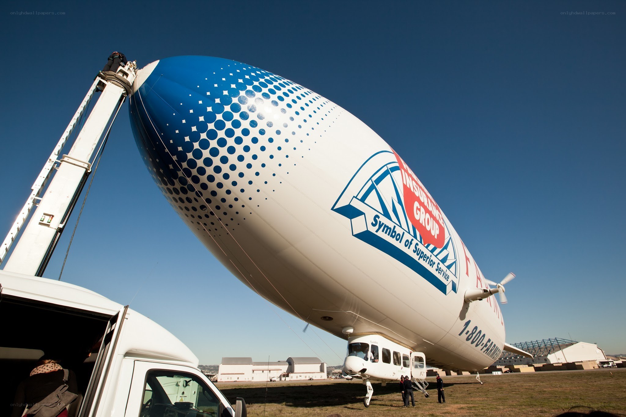Airship with branding on field