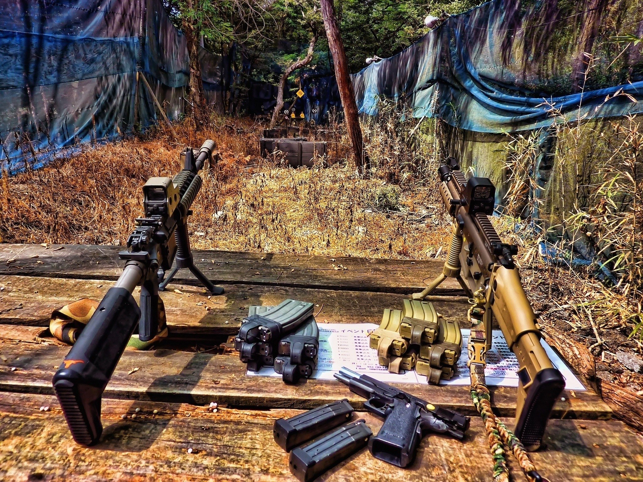 Airsoft guns at outdoor range
