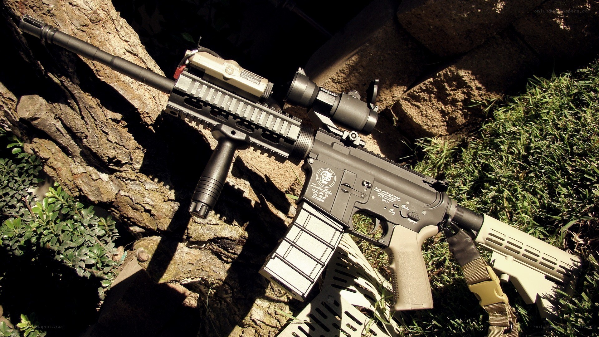 airsoft rifle on grass