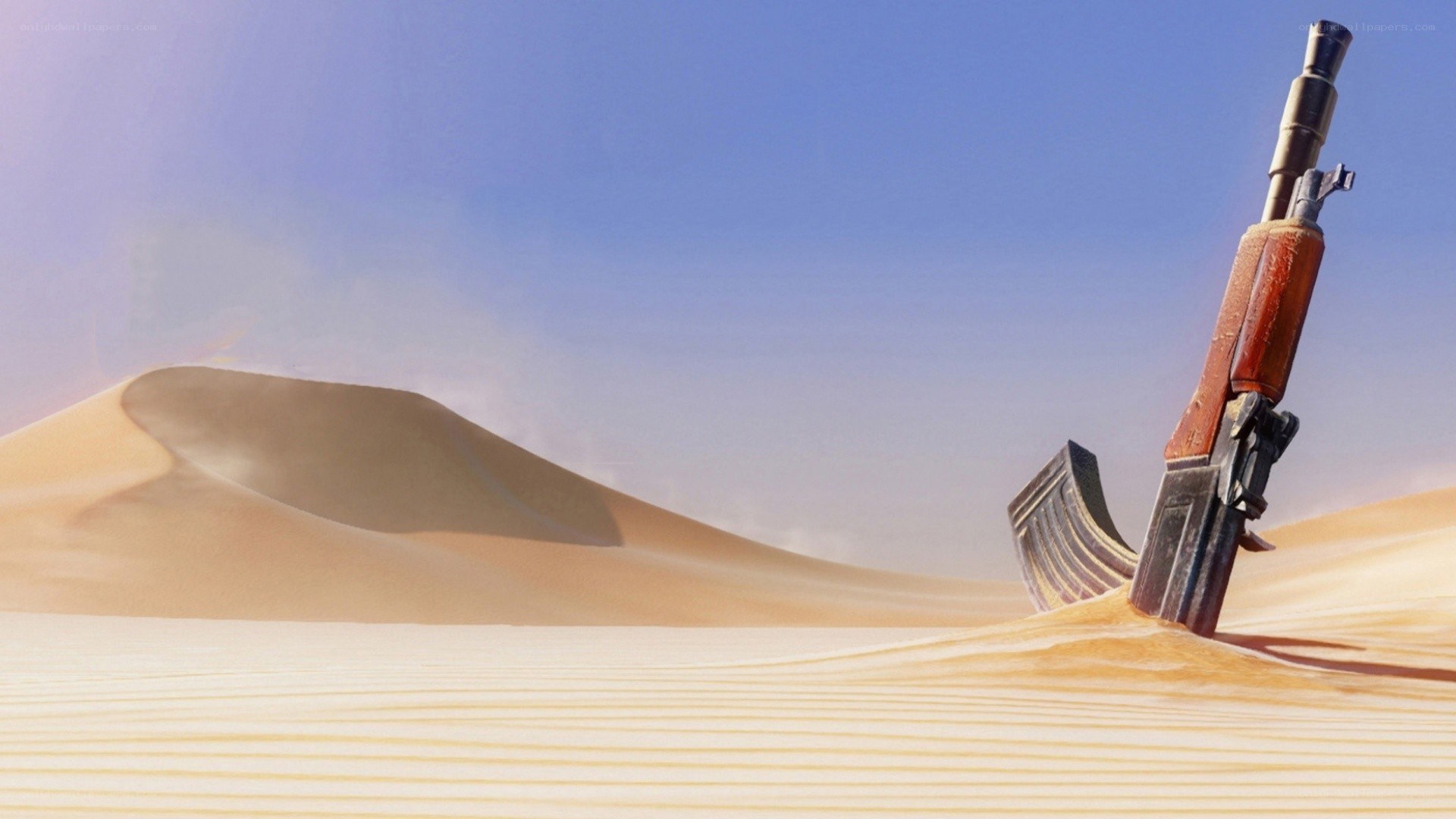 AK-47 in desert sand