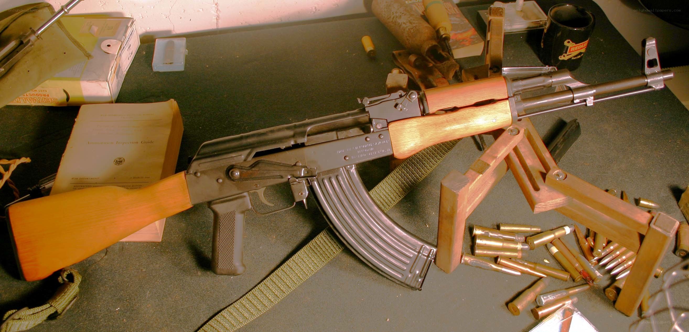 AK-47 rifle on workbench