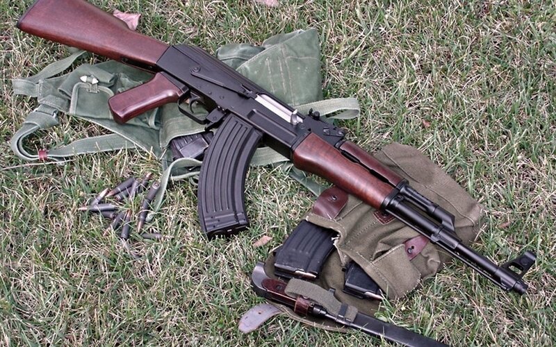 AK-47 rifle with magazines