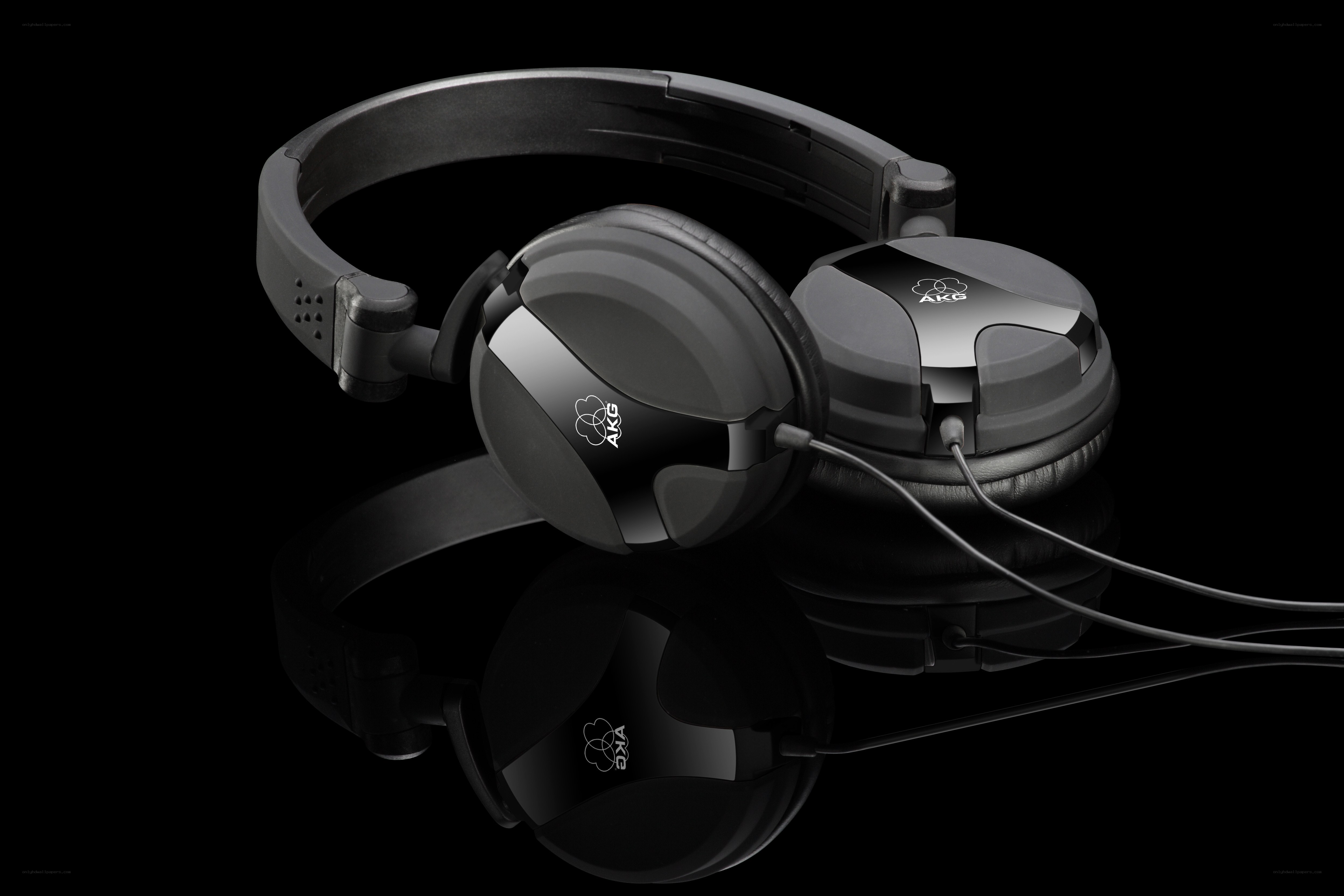AKG headphones on black surface