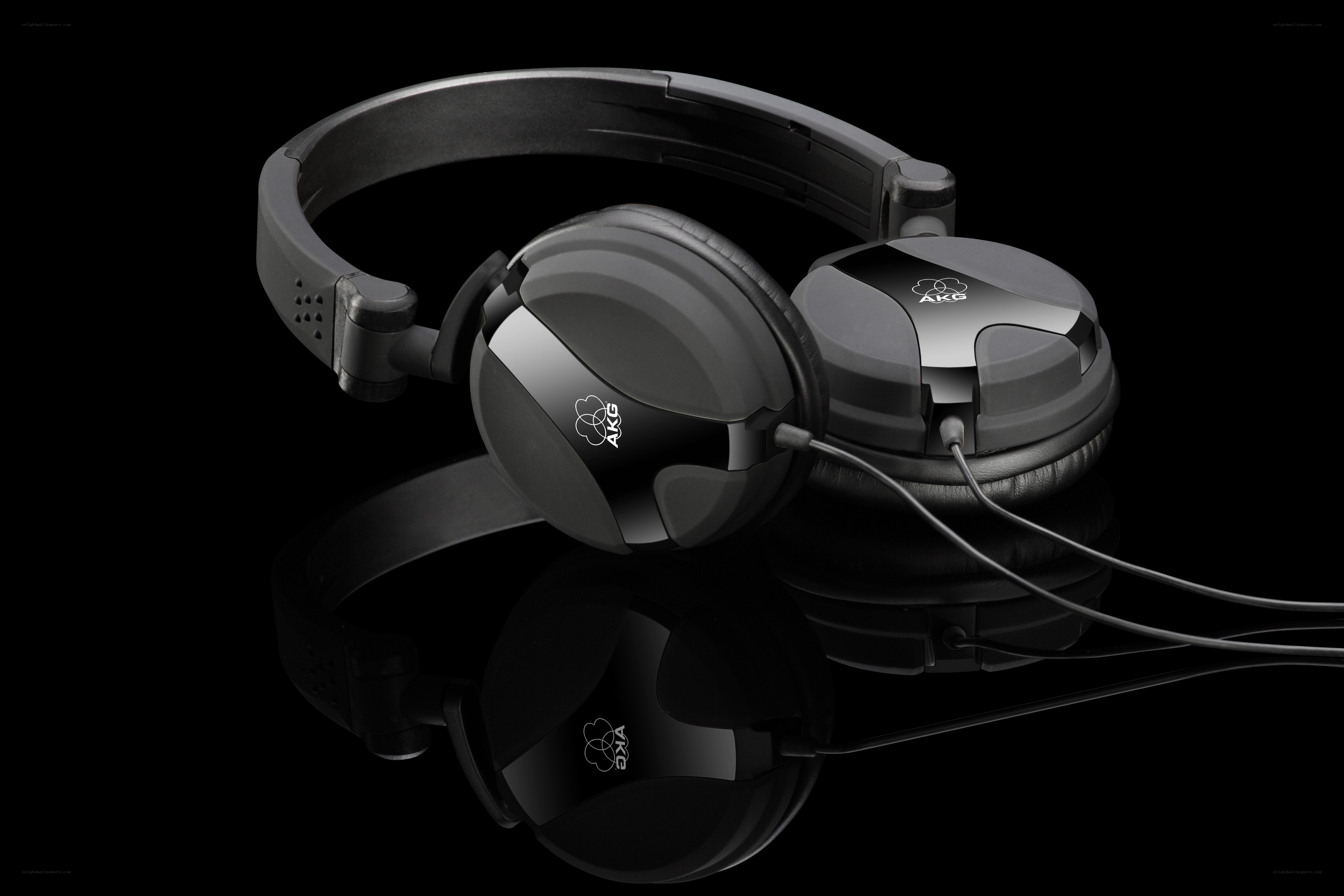 AKG headphones on black surface