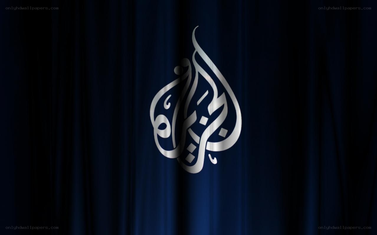 Al Jazeera logo on curtain