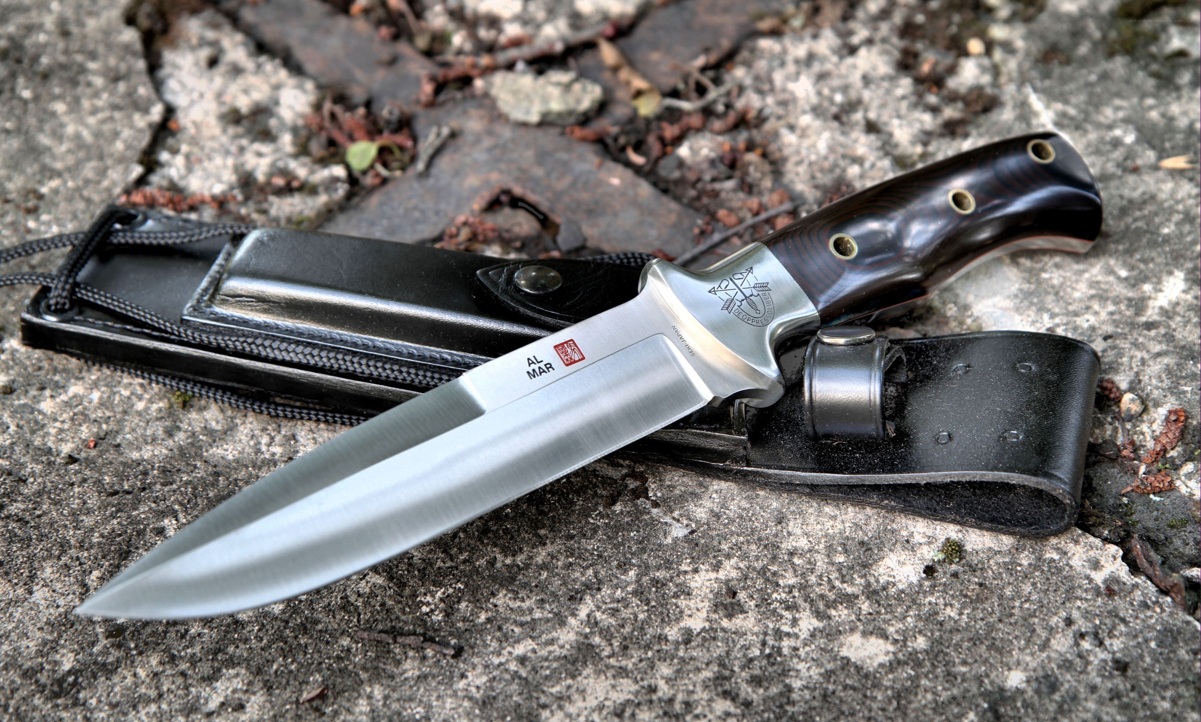 Al Mar knife on stone