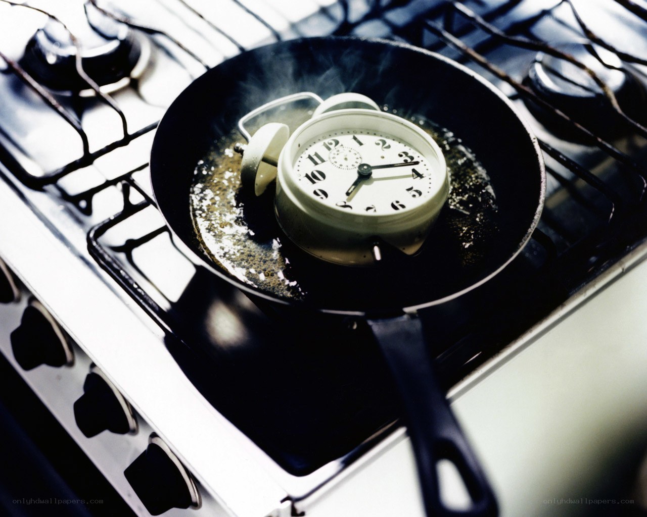 alarm clock in frying pan