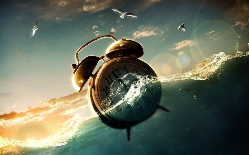 alarm clock in ocean waves