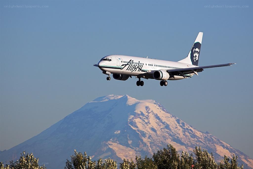 Alaska Airlines plane near mountain