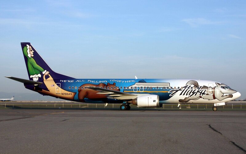 Alaska Airlines plane with cartoon livery