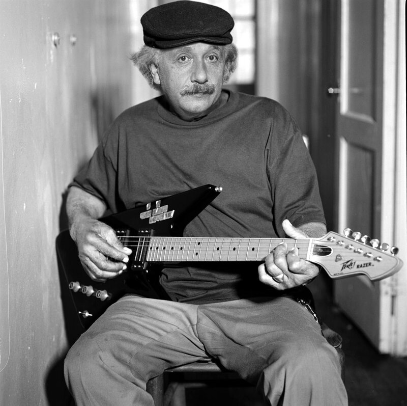 Albert Einstein playing guitar