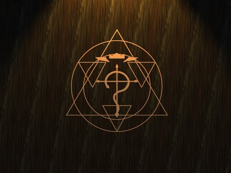 alchemical symbol on wood