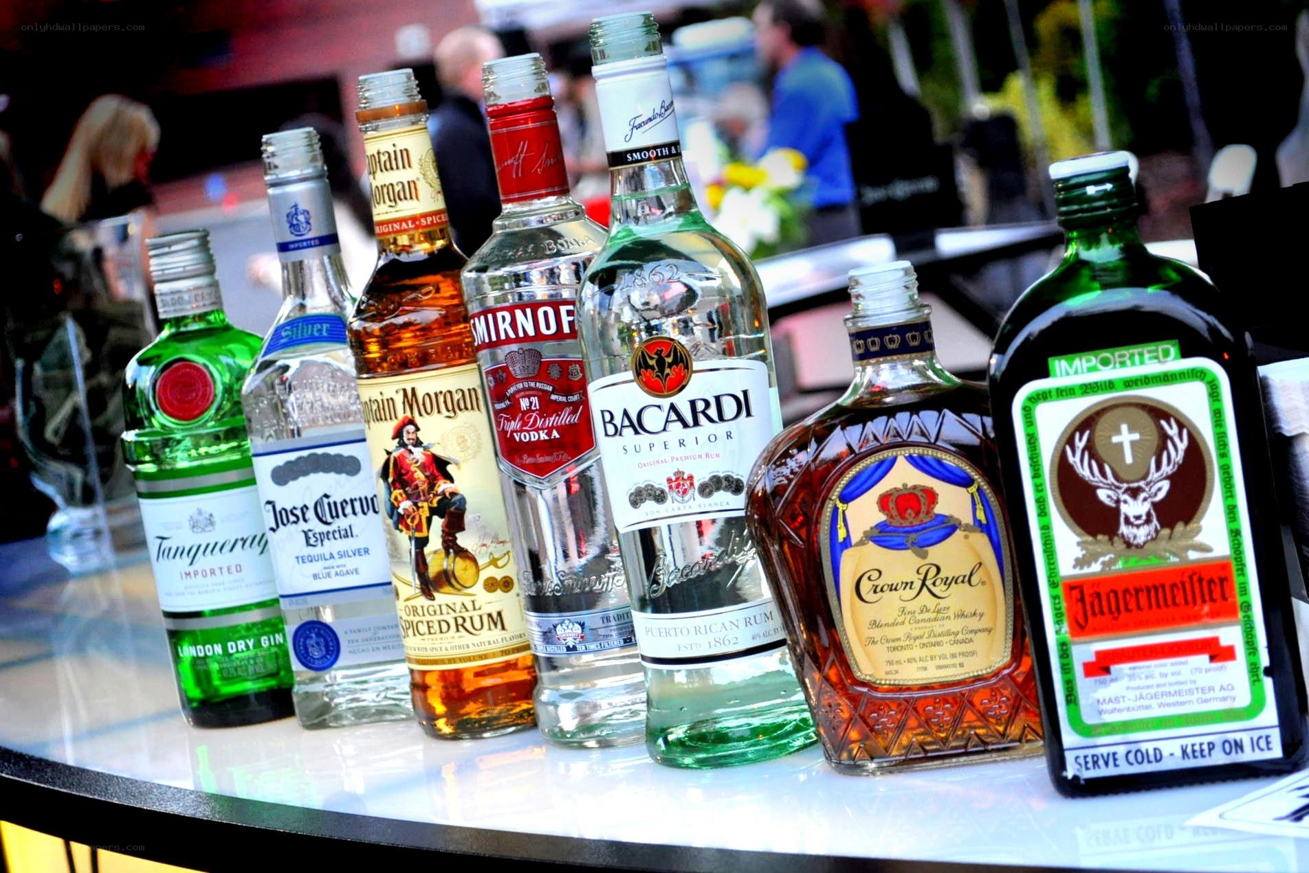 alcohol bottles on a bar